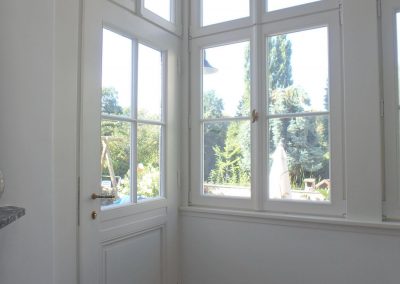 Innenansicht Wintergarten mit Fenster und Eingangstür