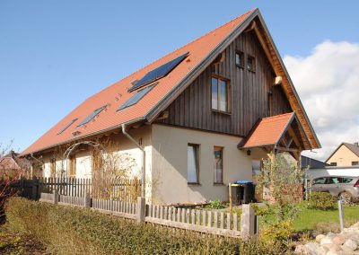 Biberschwanz-Doppeldeckung mit Solarthermie und Dachfenstern